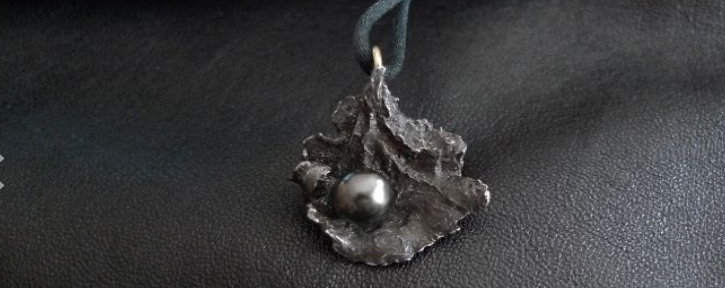 natural shaped meteorite with a cultured Tahiti pearl