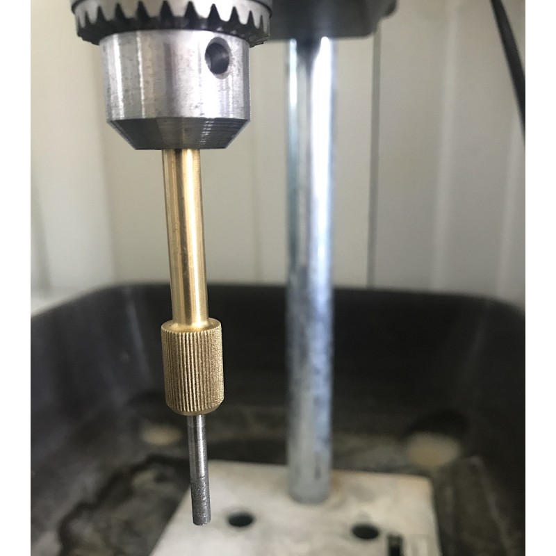 Diamond covered hollow drilling bit in the column drilling machine